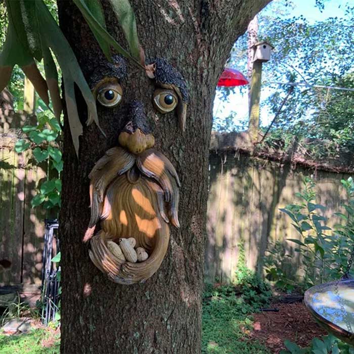 BirdFeeder, a tree decoration in the shape of a face that is also a bird feeder - Image 6