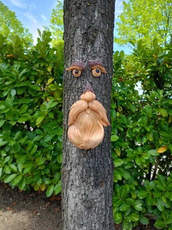 BirdFeeder, a tree decoration in the shape of a face that is also a bird feeder - Image 10