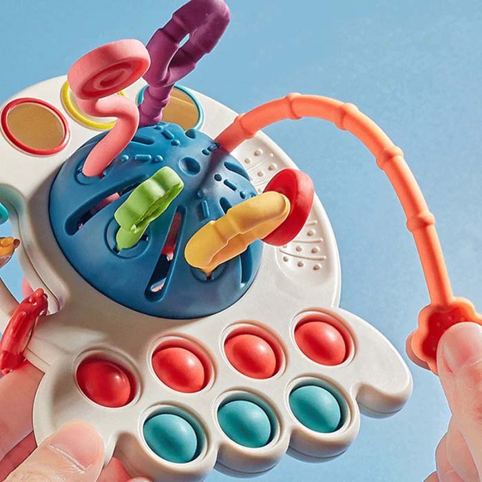The toy has many features (push buttons, pull cords, rings, etc.) and textures that stimulate sensory development!