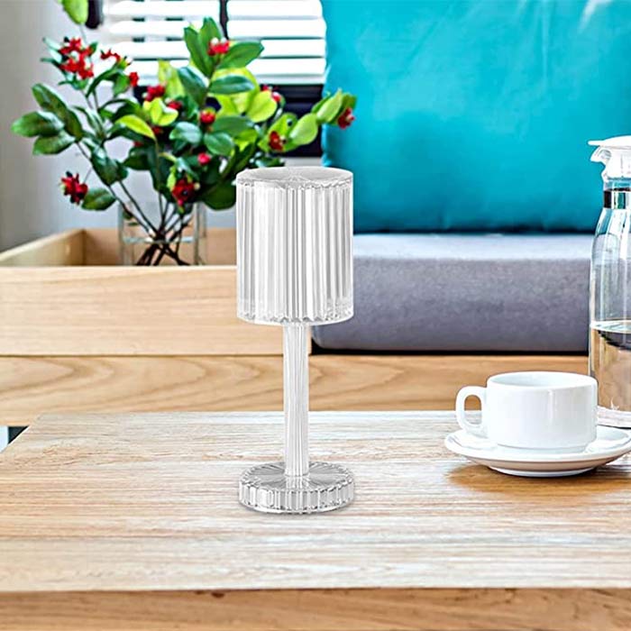 You can switch on the lamp by touch or by remote control.