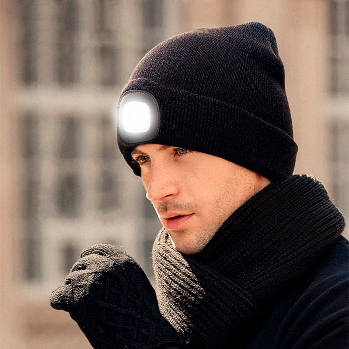A hat with an ice light ensures safety and visibility on the road.