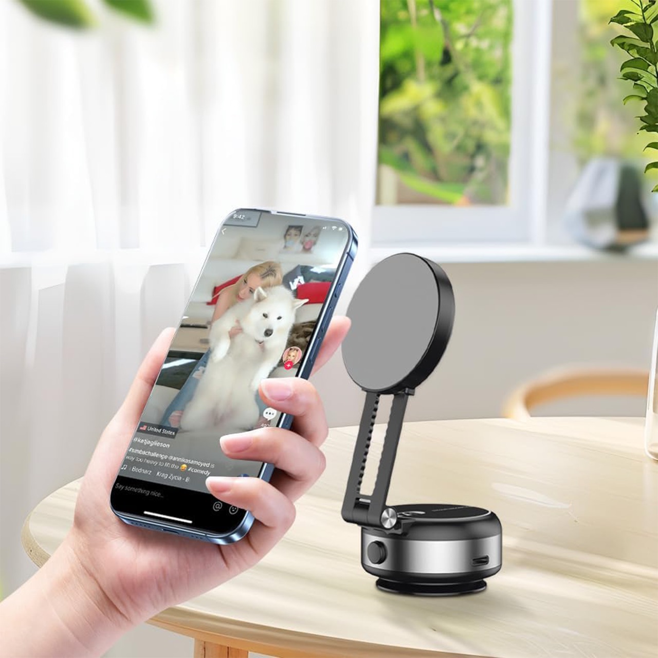 You can also attach your phone to different magnetic surfaces with a strong magnet.