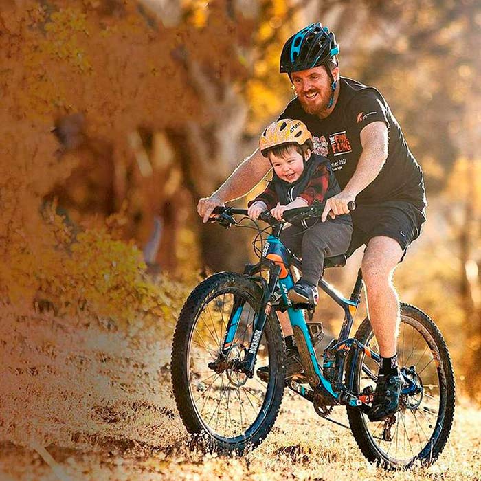 The child bike seat also has an armrest and footrests for a more comfortable ride!