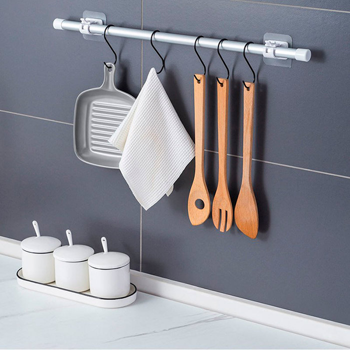 Insert the rod between the hooks and hang the desired accessories on it!