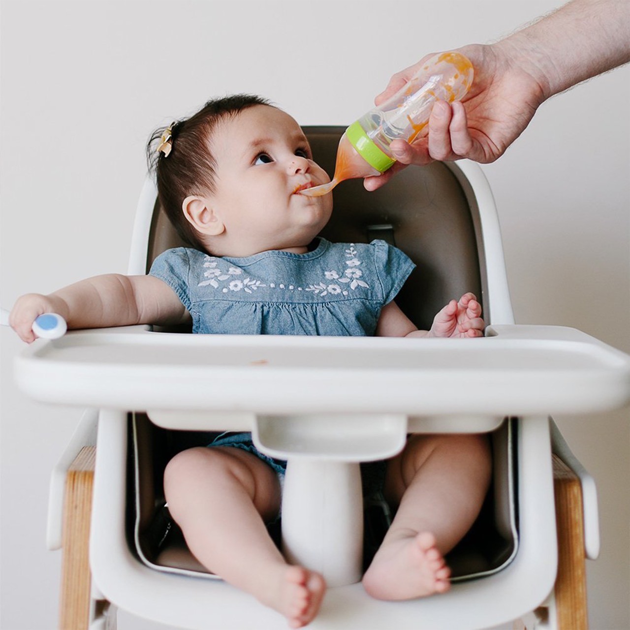Innovative design for easy feeding - squeeze the bottle and the food will gently flow into the spoon.